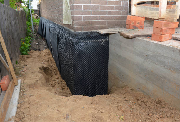Happy homeowners after waterproofing job in Wilmette
